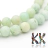 Tumbled round beads made of quartz imitating amazonite mineral with a diameter of 6 mm with a hole for a thread with a diameter of 1 mm. The beads are completely natural without any dye.
Country of origin: China
THE PRICE IS FOR 1 PCS.
