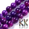 Tumbled round beads made of dyed natural mineral crazy agate imitating sugilite with a diameter of 8 mm with a hole for a thread with a diameter of 1 mm. The beads are completely natural, they have been dyed and the colors have been fixed with heat.
Country of origin: South Africa
THE PRICE IS FOR 1 PCS.