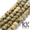 Tumbled round beads made  of natural mineral feldspar in light yellow color with a decor with a diameter of 8 mm and a hole for a thread with a diameter of 1 mm. The beads are absolutely natural without any dye and their surface is protected by clear wax.
Country of origin: China
THE PRICE IS FOR 1 PCS.