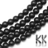 Round glass beads with an opaque black frosted surface, diameter 6 mm with a hole for a thread with a diameter of 1 mm. Beads are sold whole strands. There are approx. 63 to 67 pieces of beads on one strands.
THE PRICE IS FOR 1 STRAND / CCA 67 PCS