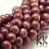 Tumbled round beads made of natural mineral lepidolite (purple mica variety) with a diameter of 8 mm with a hole for a thread with a diameter of 1 mm. The beads are completely natural without any dye.
Country of origin: China
THE PRICE IS FOR 1 PCS.