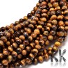 Tumbled round beads made of natural mineral tiger eye with a diameter of 6 mm with a hole for a thread with a diameter of 1 mm. The beads are absolutely natural without any dye.
Country of origin South Africa
THE PRICE IS FOR 1 PCS.