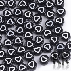 Plastic beads with white hearts - black lentils - Ø 7 x 4 mm