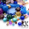 Mix of glass of beads of different shapes, colors and sizes. The beads can have the dimensions 4 -22.5 x 4-28.5 x 3-9 mm and holes for the thread 1-2 mm. In the mix you can find beads pressed and faceted, transparent and frosted, shiny and matte and small and large.
The beads are offered in a package of a random mix of 200 grams and the color and shape composition in the illustrative image is thus purely indicative.
THE PRICE IS FOR 200 g