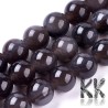 Tumbled round beads made of natural mineral ice obsidian with a diameter of 8 mm with a hole for a thread with a diameter of 1 mm. The beads are completely natural without any dye.
Country of origin Mexico
THE PRICE IS FOR 1 PCS.