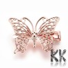 Classic iron hair clip with surface colored plating and filigree decor in the shape of a butterfly, which can be used as a finished clip or as a semi-finished product for the production of a decorative clip. It is an alligator clip with an opening joint and jaws. The hair clip measures 34 x 26 x 9.5 mm.
THE PRICE IS FOR 1 PCS.