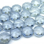 Faceted beads made of glass in a flat round shape with a carved sun and with a plated surface with a size of 14 x 8-10 mm and with a hole for a hole with a diameter of 1.5 mm. The beads are electroplated with AB plating, which refracts light and when rotated, different colours of the visible spectrum can be seen. 
THE PRICE IS FOR 1 PIECE.