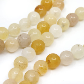 Přírodní chalcedon / imitace žlutého topazu – 6–7mm – Tromlované kuličky – Průvlek: 1mm – Množství: 1 kus